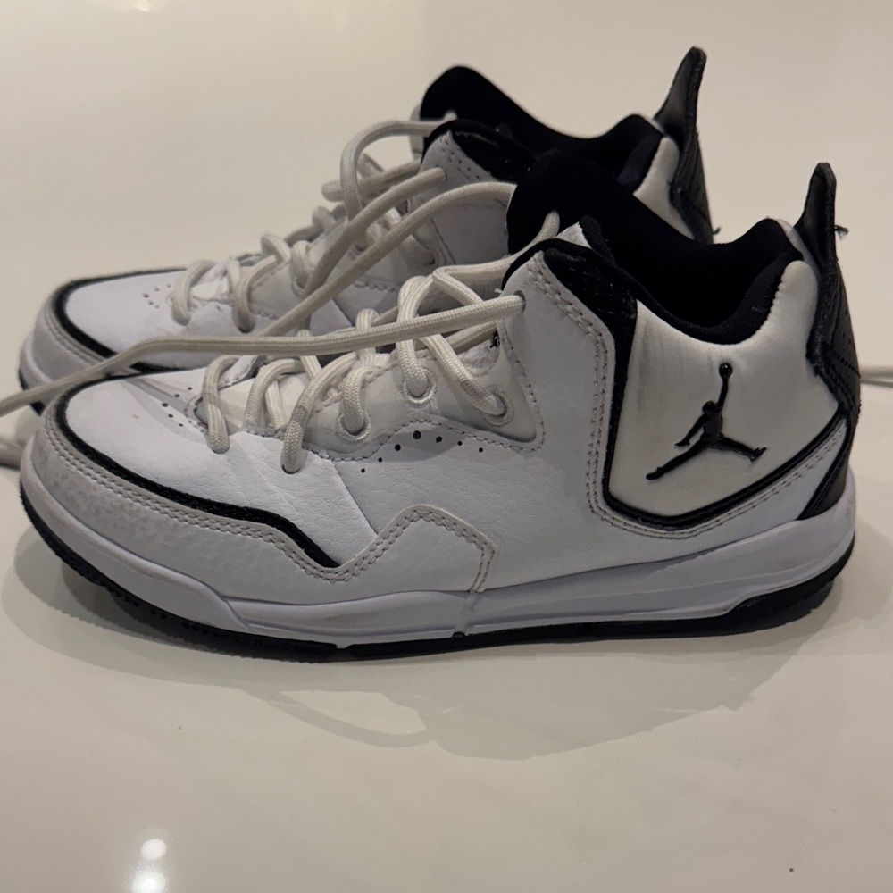 White and Black Nike basketball sneaker